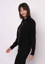 Load image into Gallery viewer, Saruna Soft Knit W/Satin Trim Top - Black
